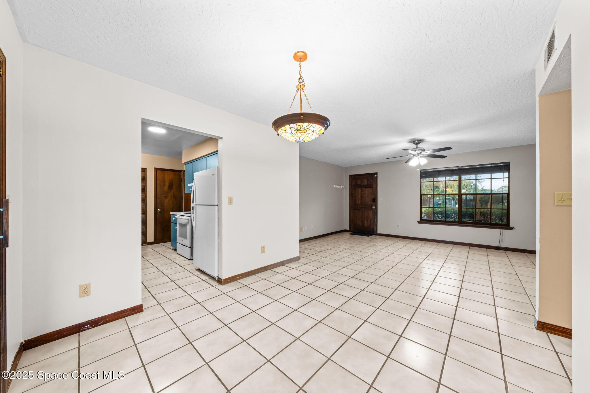 410 Albenga Road Northwest Palm Bay, FL 32907 - Photo 4 of 23 a view of a storage & utility room