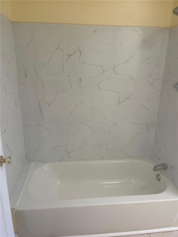 750 Legacy Place Southwest Atlanta, GA 30331 - Photo 11 of 21 a bathroom with bathtub and shower