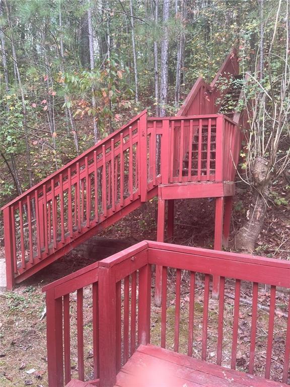 750 Legacy Place Southwest Atlanta, GA 30331 - Photo 5 of 21 a view of a wooden house with large windows