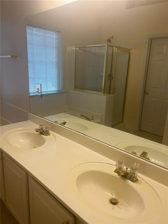 750 Legacy Place Southwest Atlanta, GA 30331 - Photo 10 of 21 a bathroom with a sink and a mirror