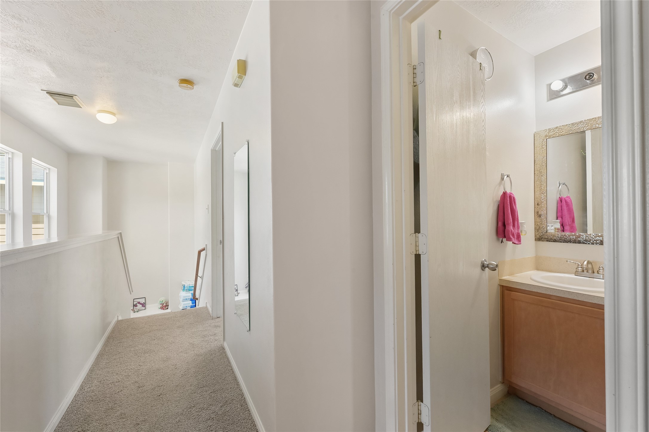1819 Emerald Pathway Drive Spring, TX 77388 - Photo 15 of 23 upstairs hallway