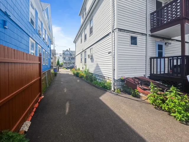 a view of a house with a street