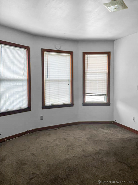 532 Carroll Avenue, Unit 2 Bridgeport, CT 06607 - Photo 8 of 16 an empty room with windows