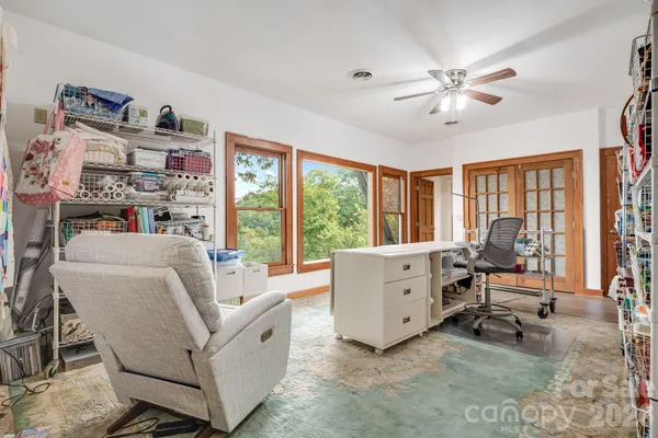 a living room with furniture and a window