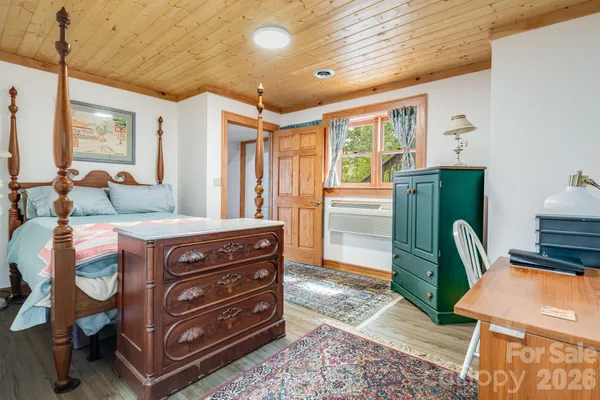 a room with furniture and a window