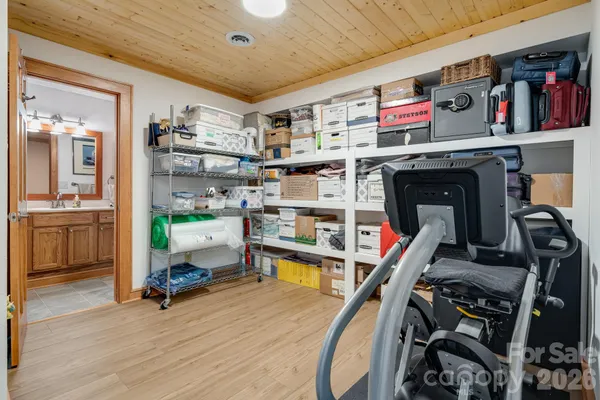 a view of a room with racks air hockey table
