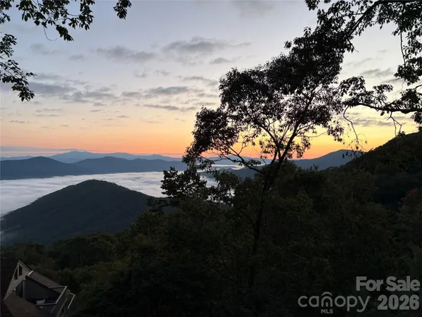 a view of sunset and yard