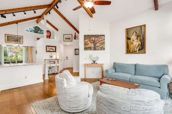a living room with furniture and window