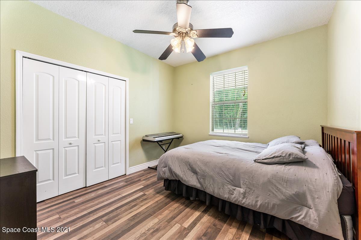 1120 Reed Grove Road Oak Hill, FL 32759 - Photo 22 of 40 1120bedroom2