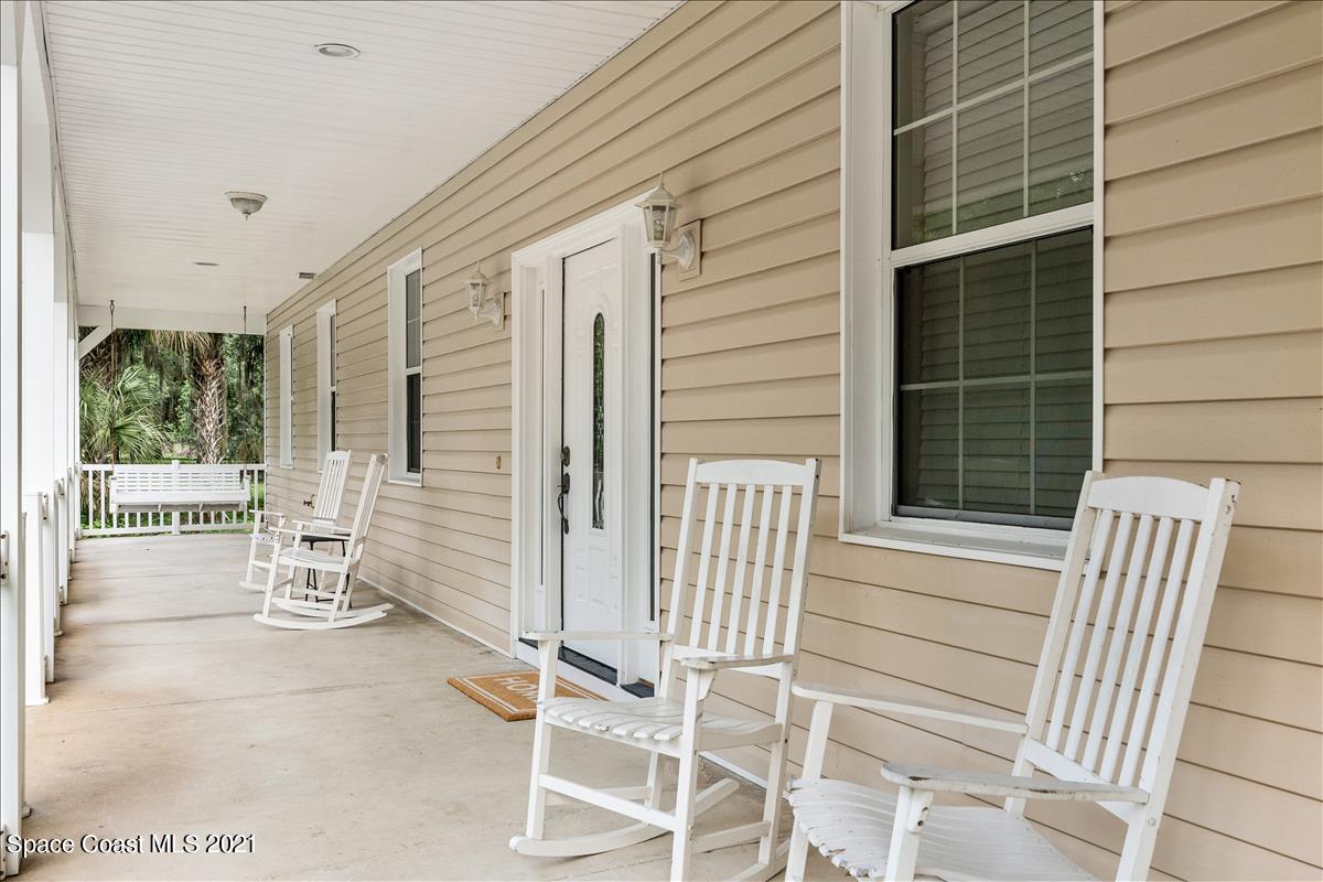 1120 Reed Grove Road Oak Hill, FL 32759 - Photo 36 of 40 wrap aroundporch
