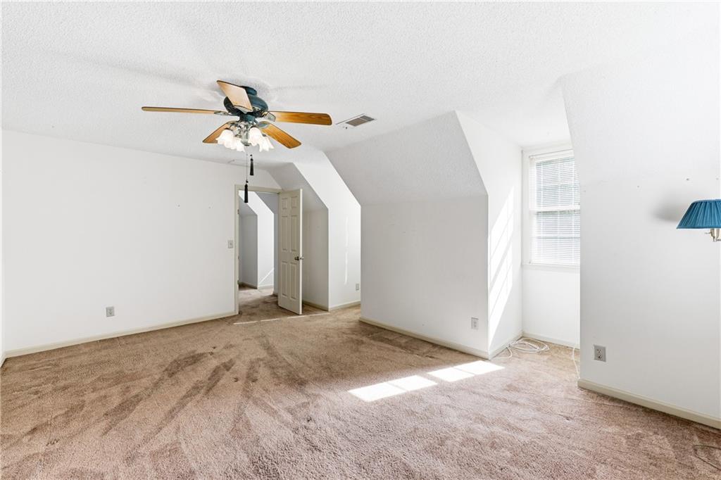 3608 Maple Forge Lane Gainesville, GA 30504 - Photo 28 of 45 a view of a room with a ceiling fan