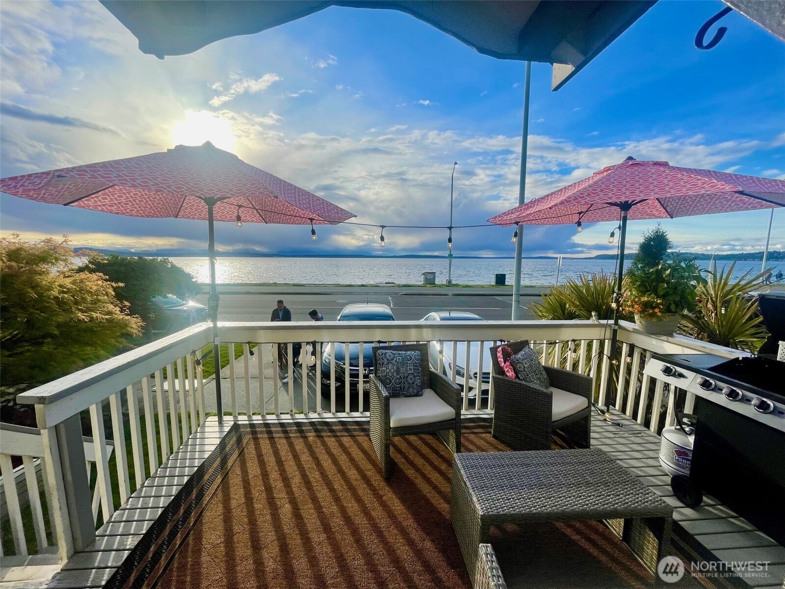 an outdoor view of patio with umbrella