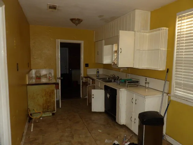 a utility room with washer and dryer