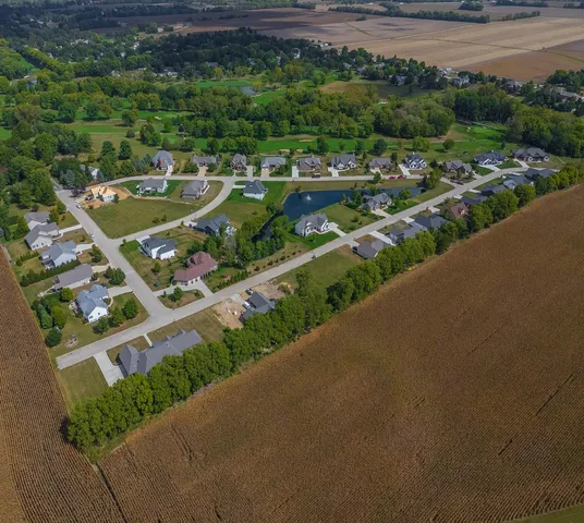 a view of a street with a yard