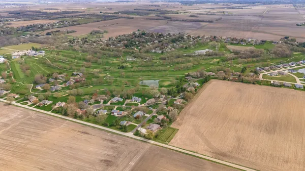 an aerial view of a residential houses