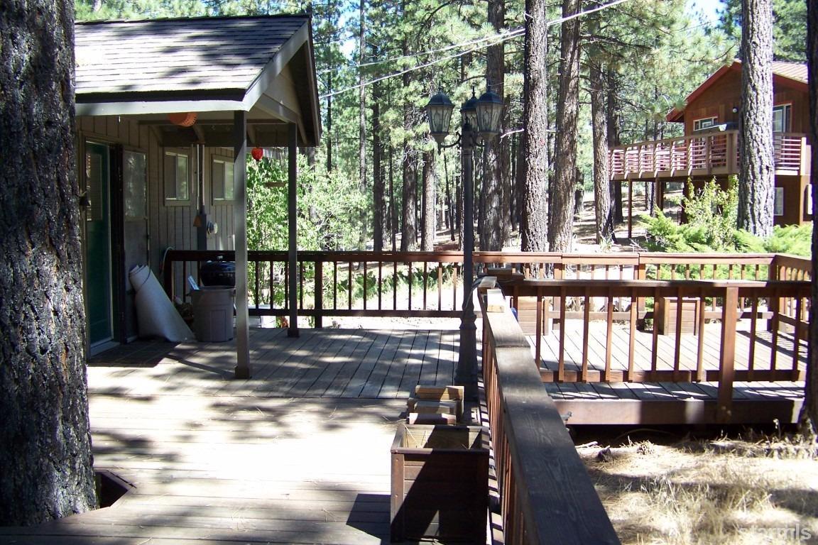 165 Pinion Road Markleeville, CA 96120 - Photo 27 of 34 a view of a porch with wooden floor
