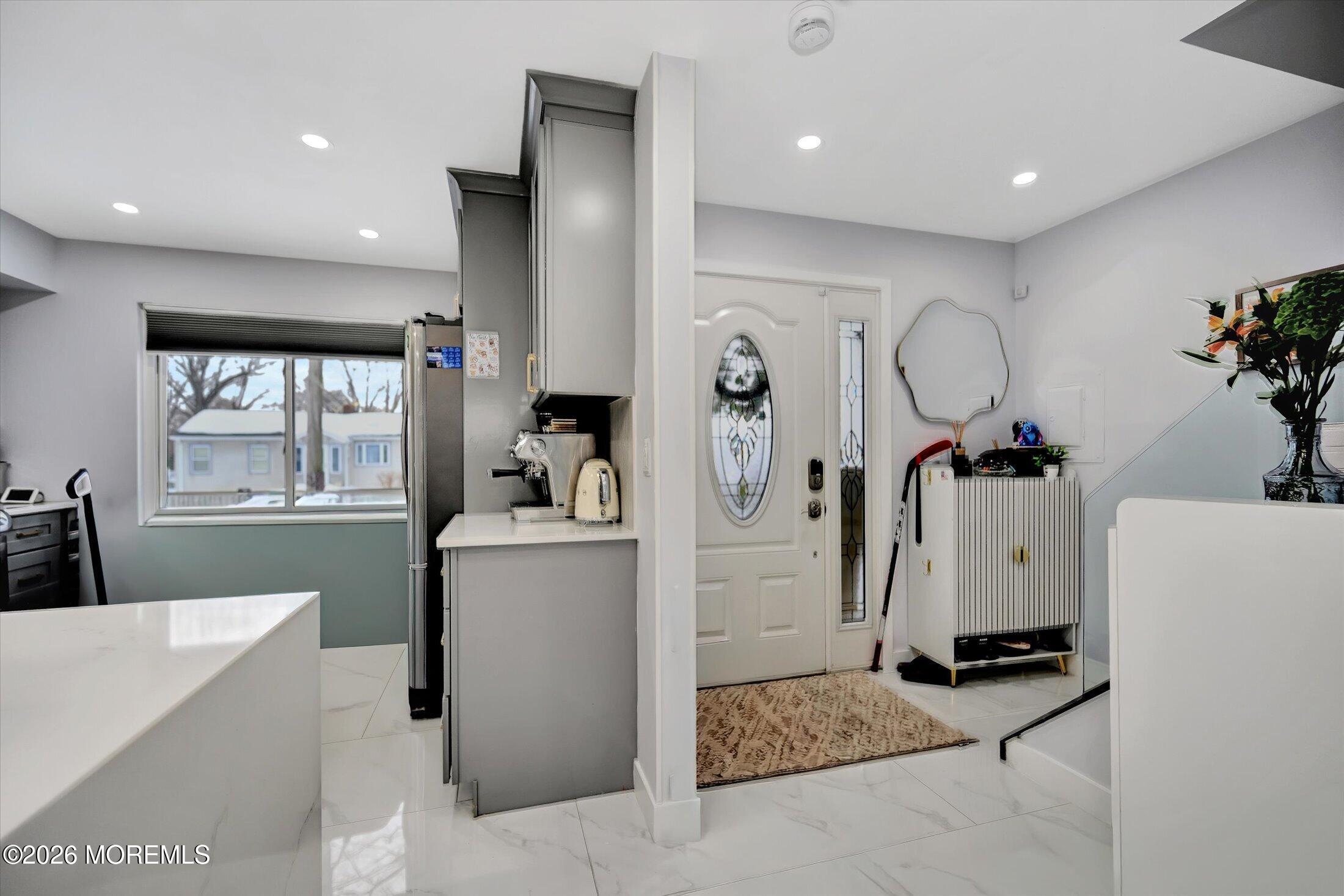 301 Ryan Street Matawan, NJ 07747 - Photo 4 of 40 03-Foyer to Kitchen