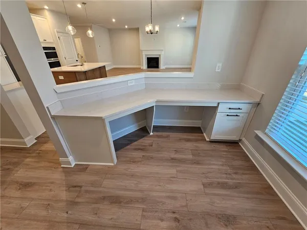 a view of a kitchen with a sink and dishwasher in kitchen