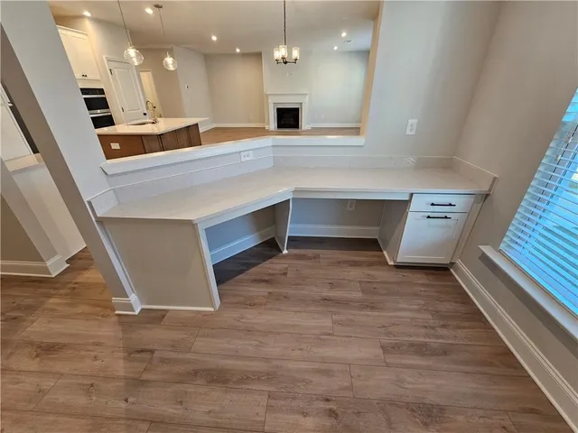 a view of a kitchen with a sink and dishwasher in kitchen