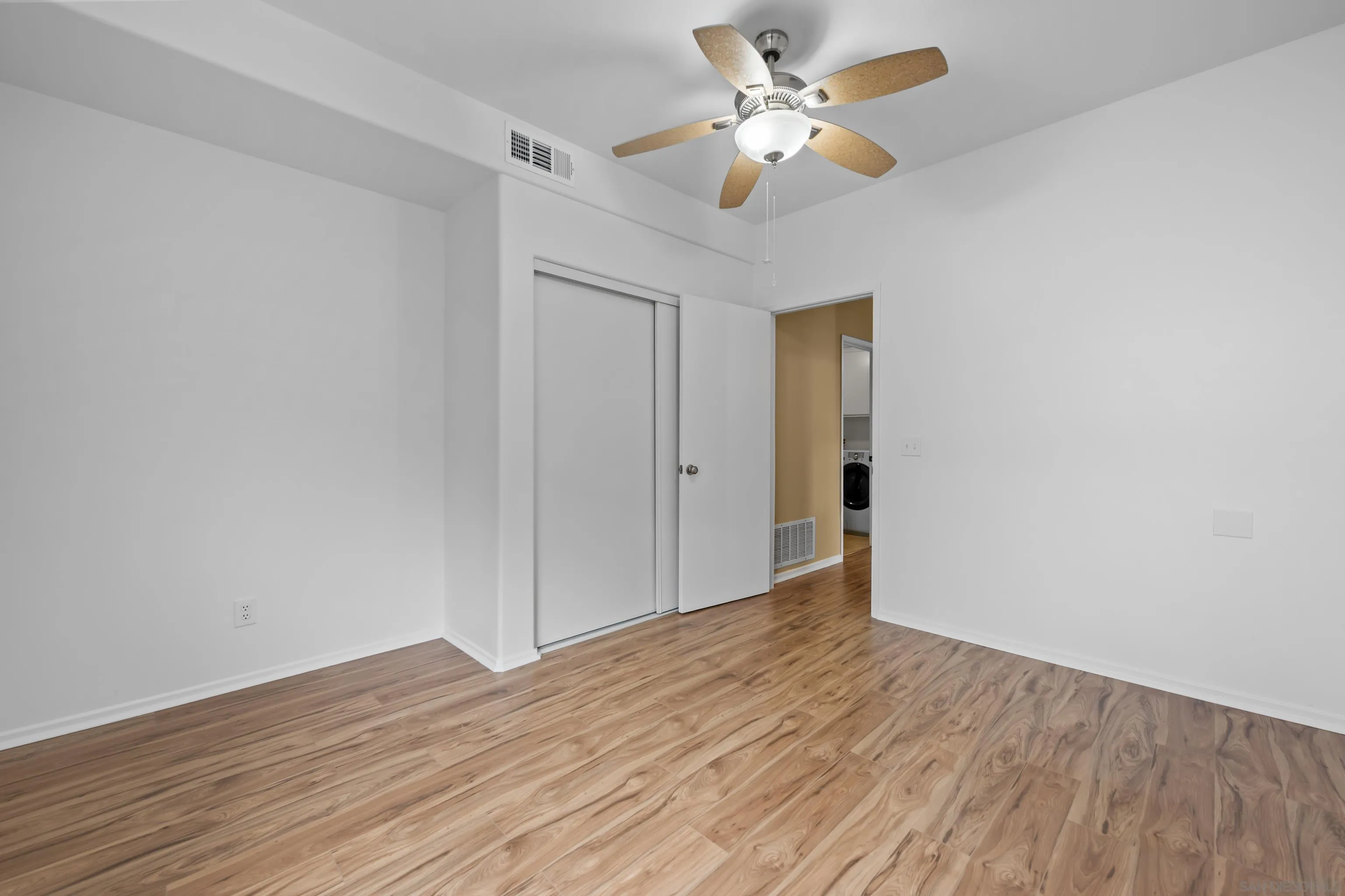 3267 Dehesa Road, Unit 69 El Cajon, CA 92019 - Photo 23 of 34 a view of an empty room with wooden floor