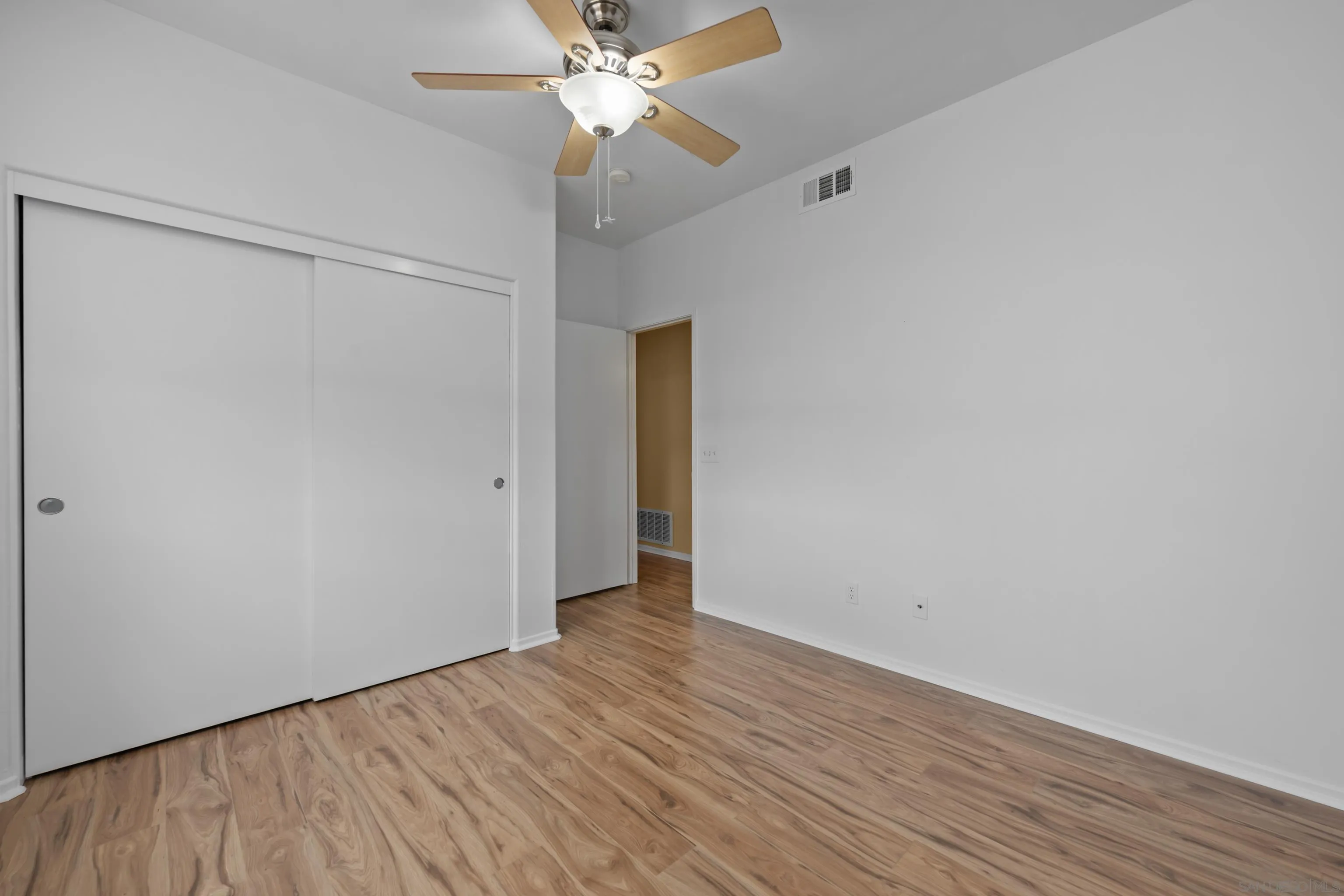 3267 Dehesa Road, Unit 69 El Cajon, CA 92019 - Photo 27 of 34 a view of an empty room with wooden floor
