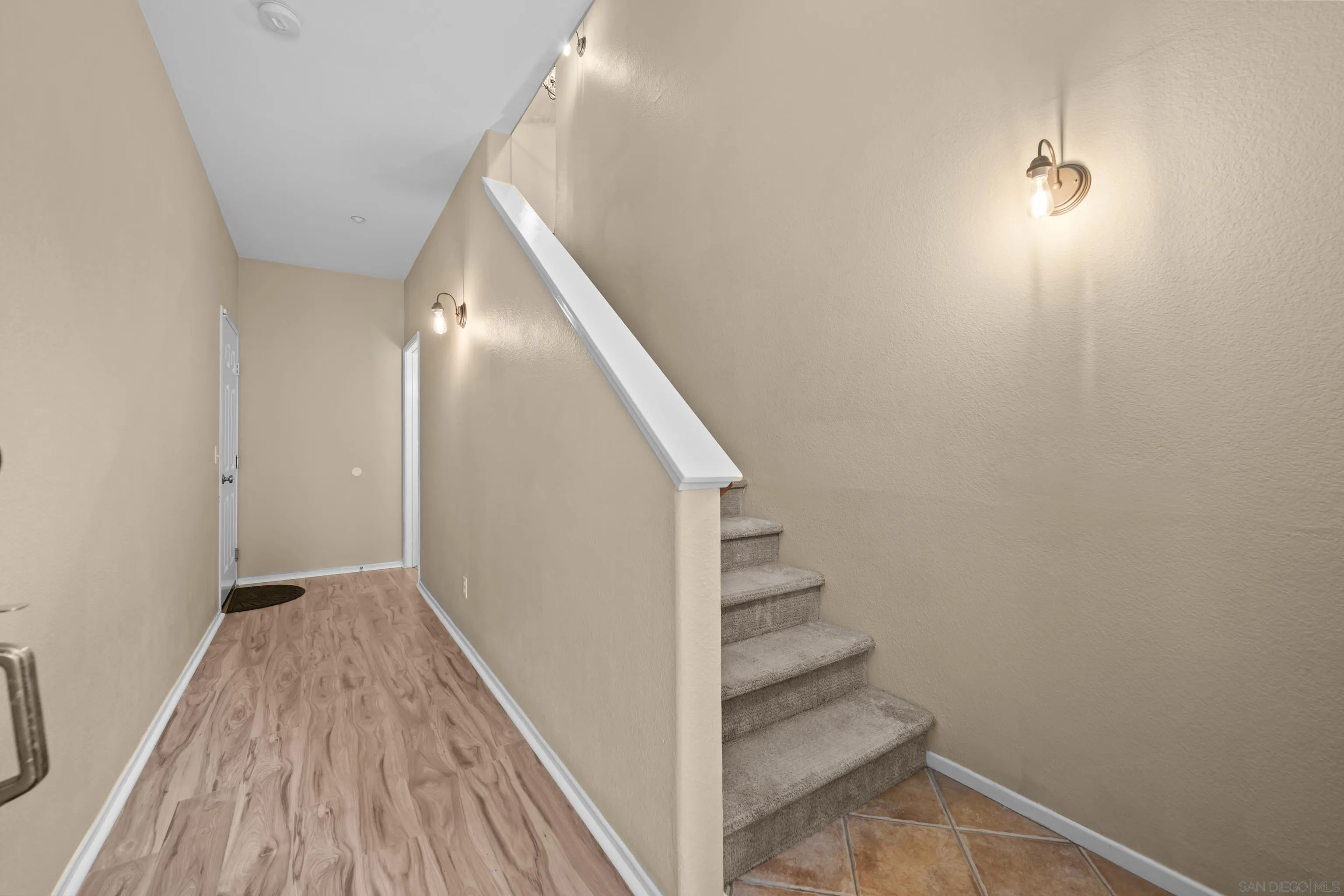 3267 Dehesa Road, Unit 69 El Cajon, CA 92019 - Photo 7 of 34 a view of a hallway with wooden floor and entryway