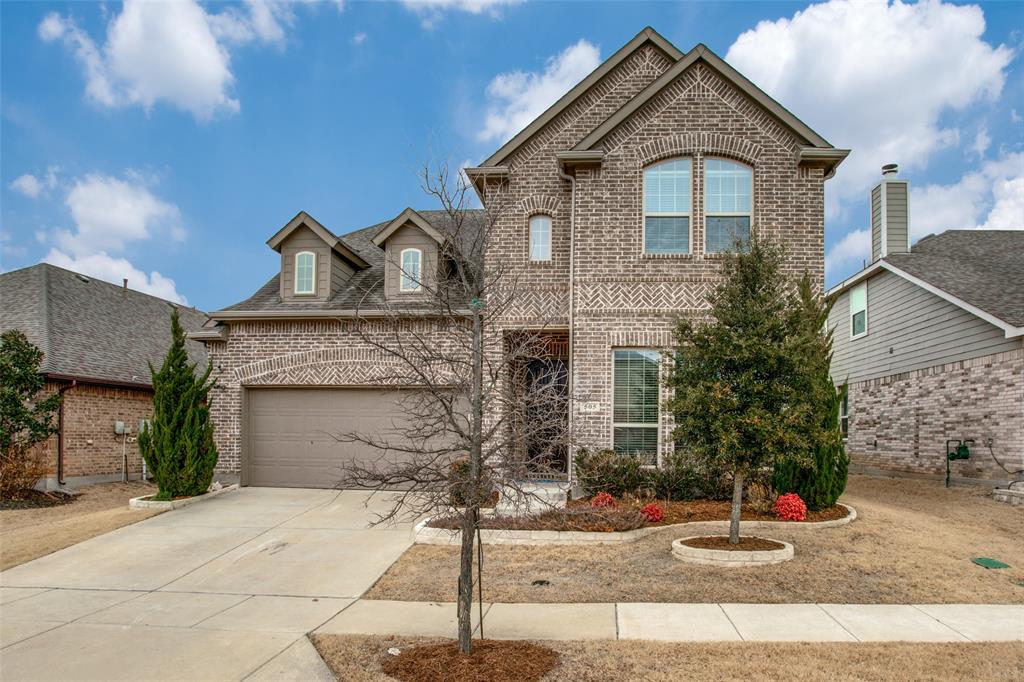 a front view of a house with street