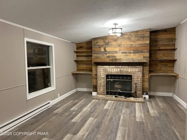a living room with a fireplace