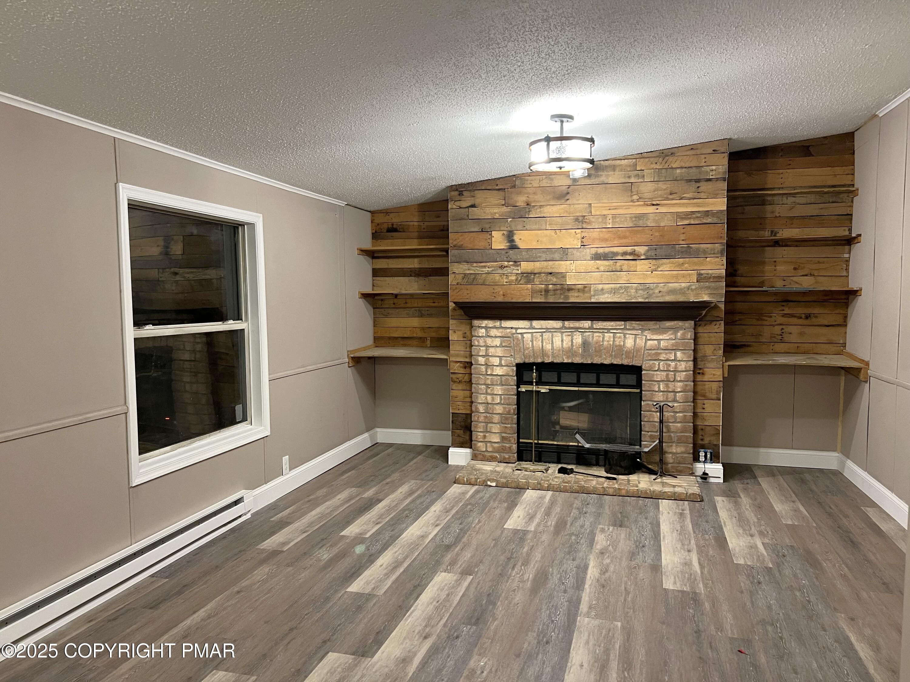 a living room with a fireplace