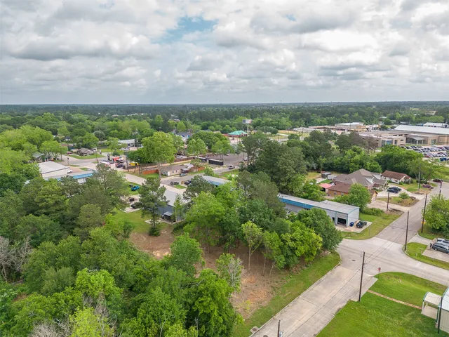 an aerial view of residential houses with outdoor space and entertaining space