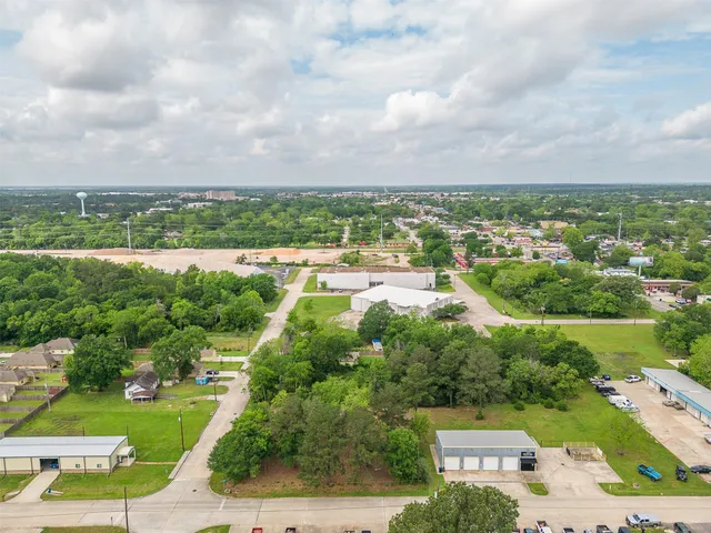 an aerial view of residential house with outdoor space