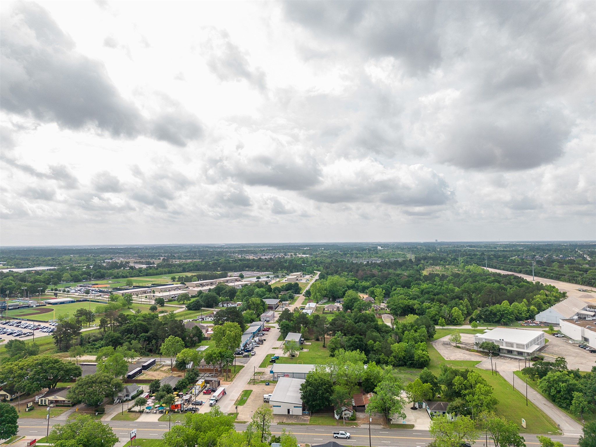 Tbd Mechanic Street Tomball, TX 77375 - Photo 19 of 24 an aerial view of residential building with green space