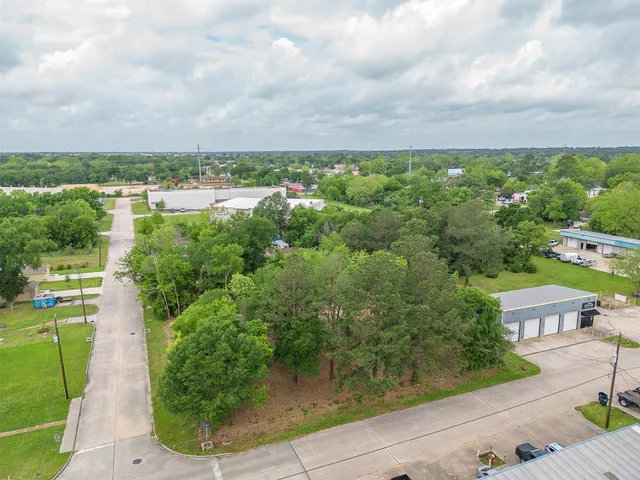an aerial view of house with yard
