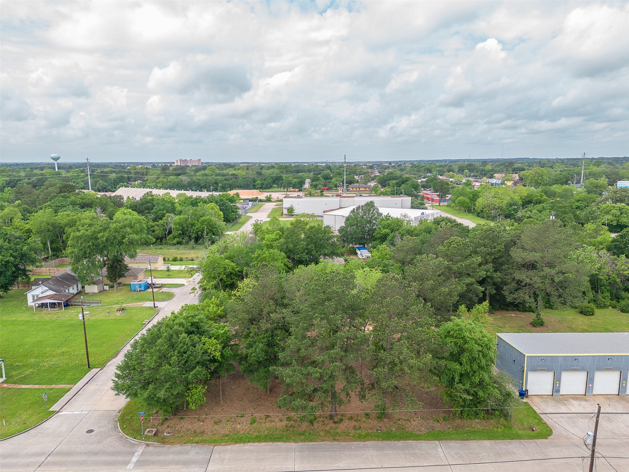 Tbd Mechanic Street Tomball, TX 77375 - Photo 6 of 24 an aerial view of a residential houses with outdoor space and trees