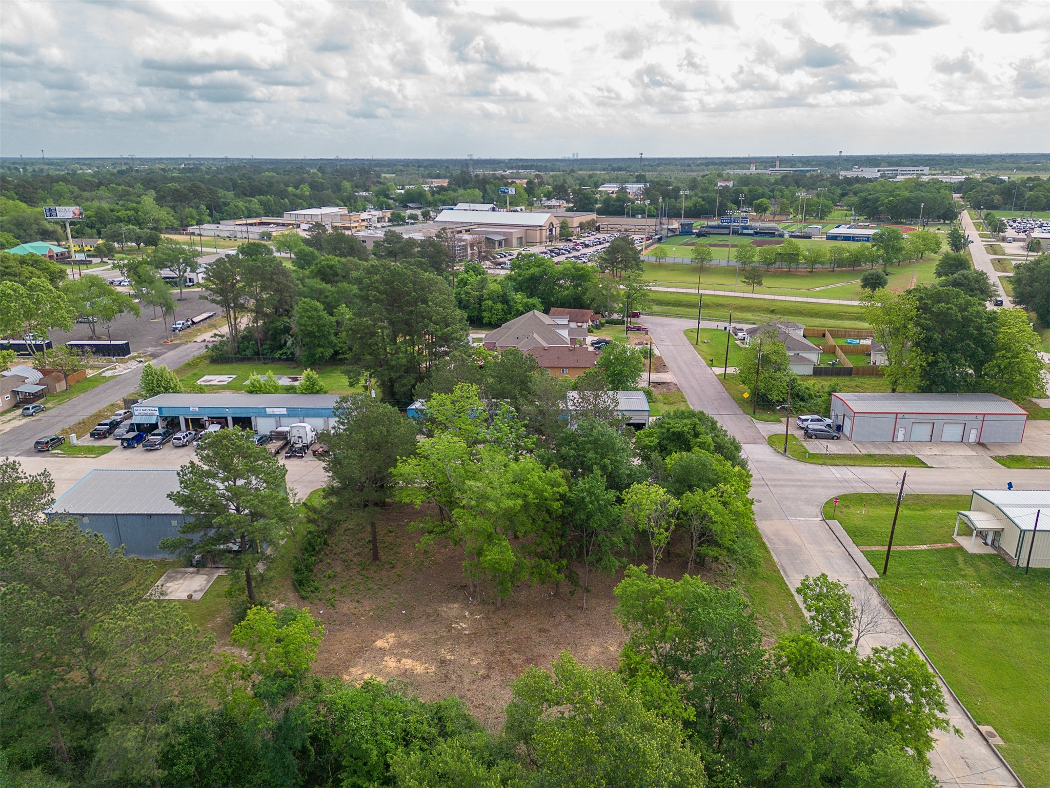 Tbd Mechanic Street Tomball, TX 77375 - Photo 10 of 24 an aerial view of city lake and trees all around