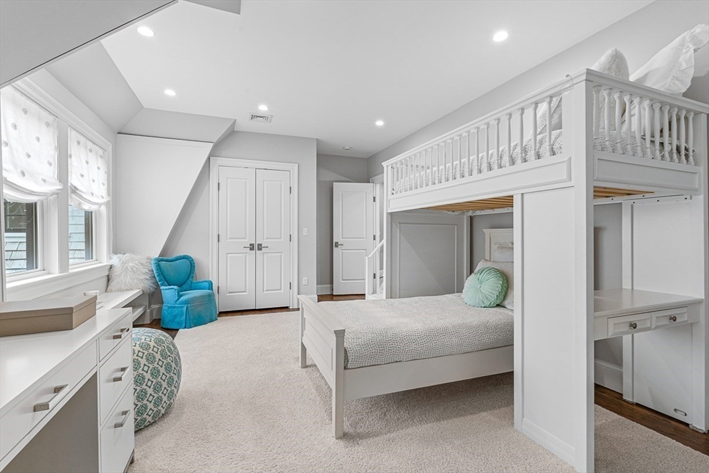 168 Beaver Road Weston, MA 02493 - Photo 16 of 27 a bedroom with furniture and a wooden floor