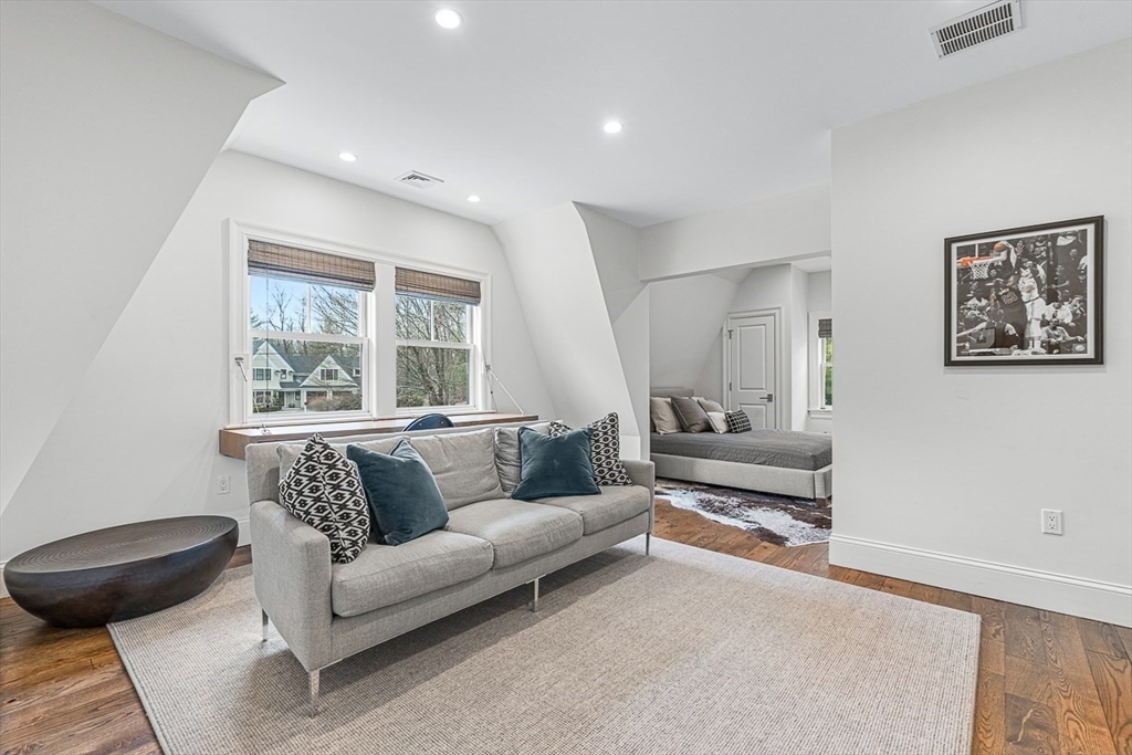 168 Beaver Road Weston, MA 02493 - Photo 17 of 27 a living room with furniture and a large window