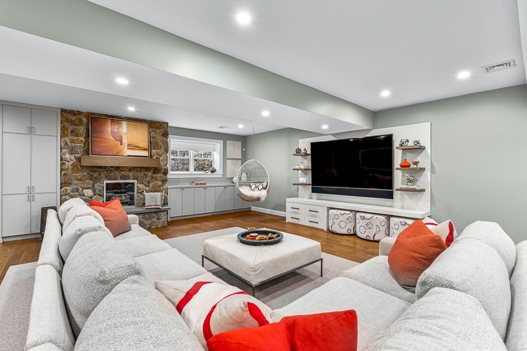 168 Beaver Road Weston, MA 02493 - Photo 18 of 27 a living room with furniture and a flat screen tv