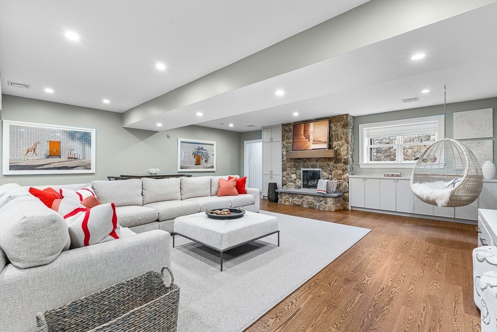 168 Beaver Road Weston, MA 02493 - Photo 19 of 27 a living room with furniture and a flat screen tv