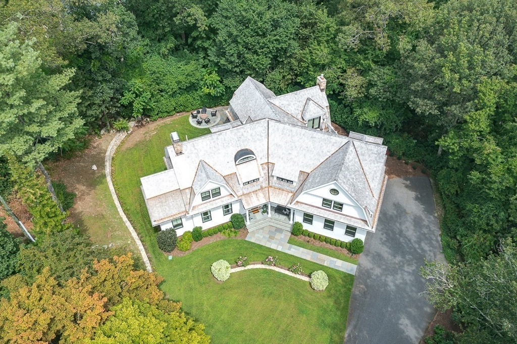 168 Beaver Road Weston, MA 02493 - Photo 27 of 27 a view of a swimming pool with a patio