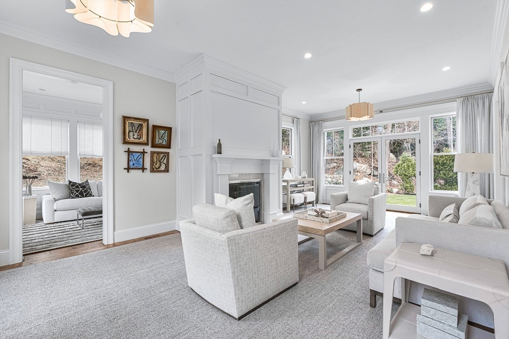 168 Beaver Road Weston, MA 02493 - Photo 4 of 27 a living room with furniture and a fireplace