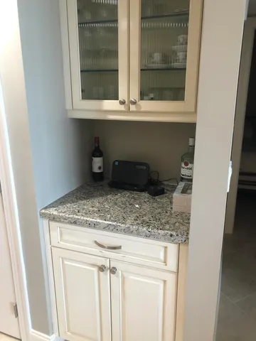 a kitchen with a sink and a window