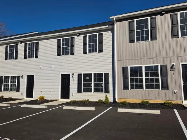 a view of a house with a patio