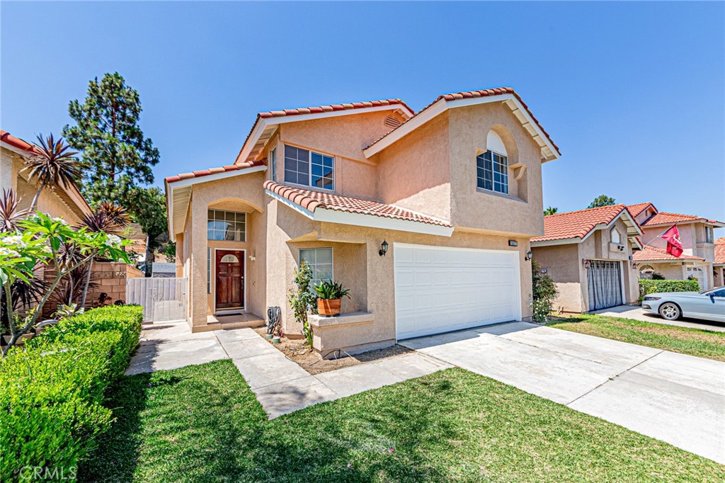 15377 Tobarra Road Fontana, CA 92337 - Photo 2 of 38 Welcoming front entrance