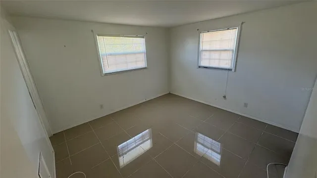 an empty room with windows