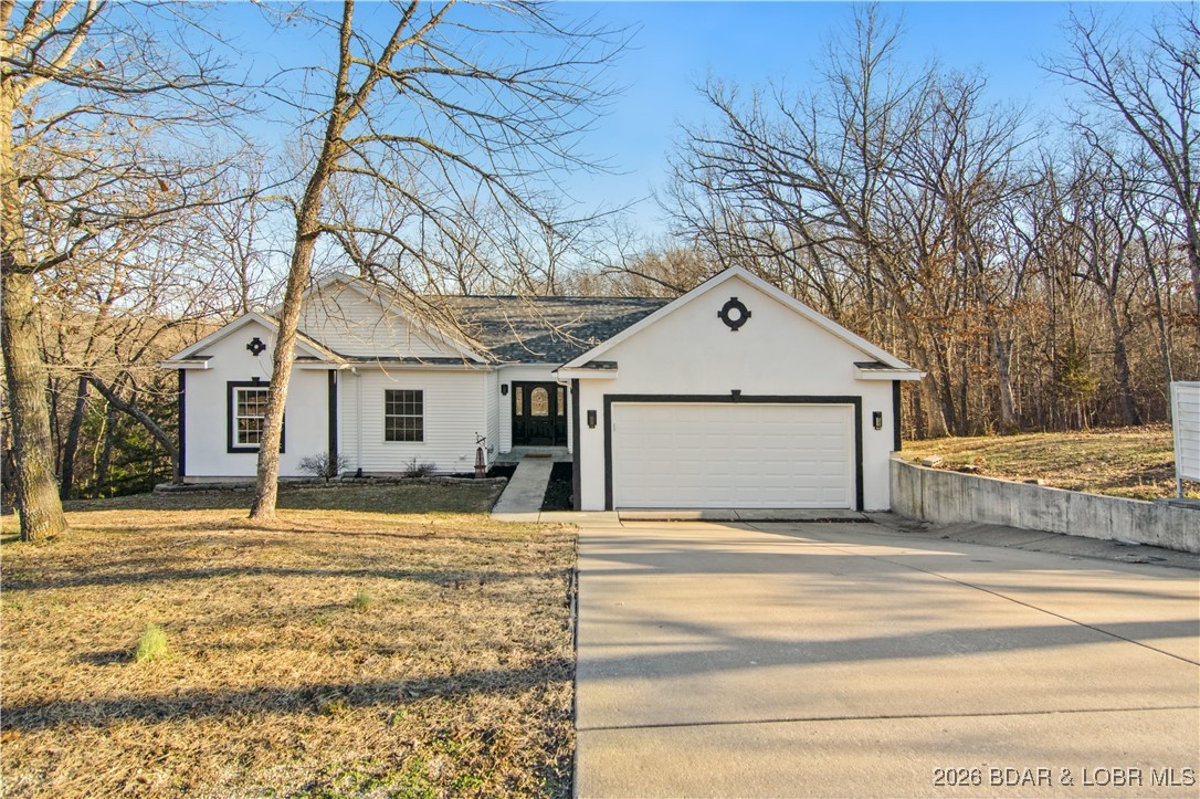 22 Navajo Road Four Seasons, MO 65049 - Photo 1 of 42 Pull up to your gentle driveway and enjoy your big