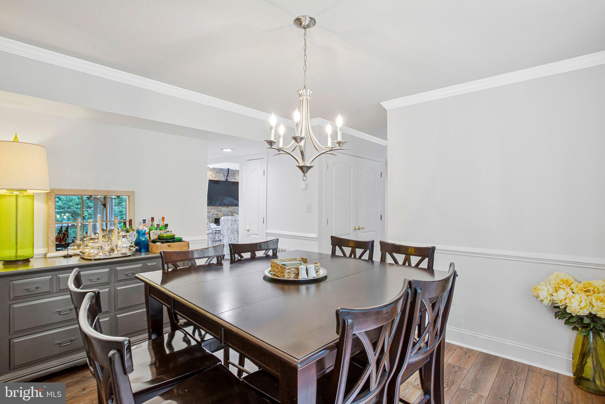1582 Snug Harbor Road Shady Side, MD 20764 - Photo 16 of 53 Elegant dining space with natural light.