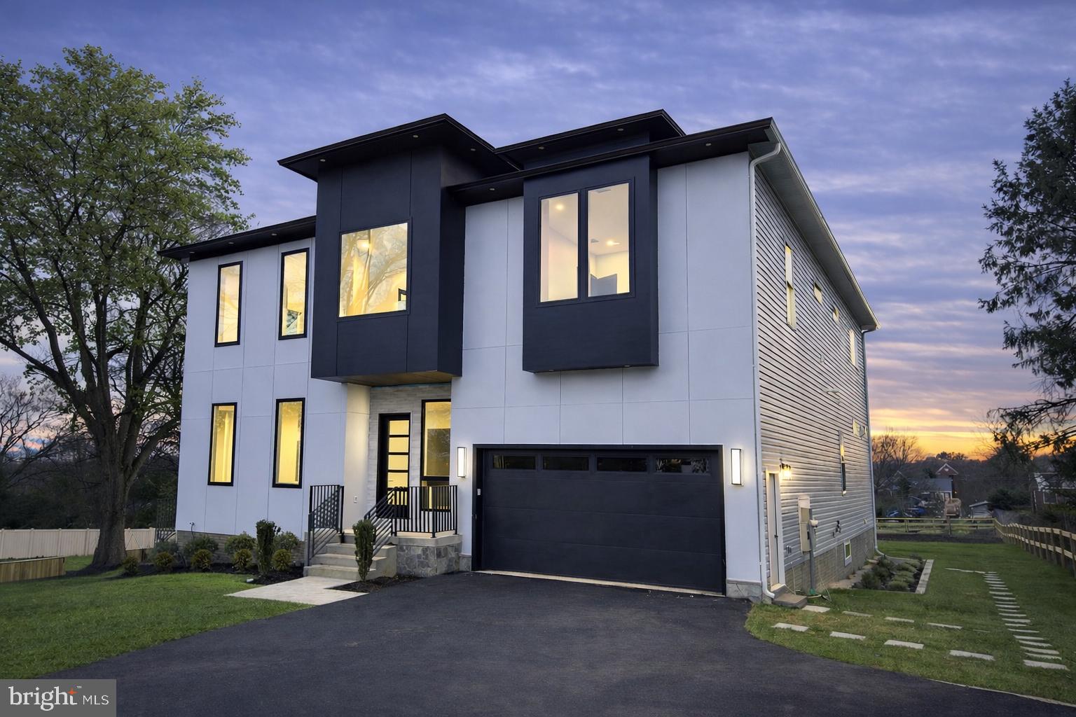 2613 Beacon Hill Road Alexandria, VA 22306 - Photo 1 of 65 Modern elegance meets serene sunset.