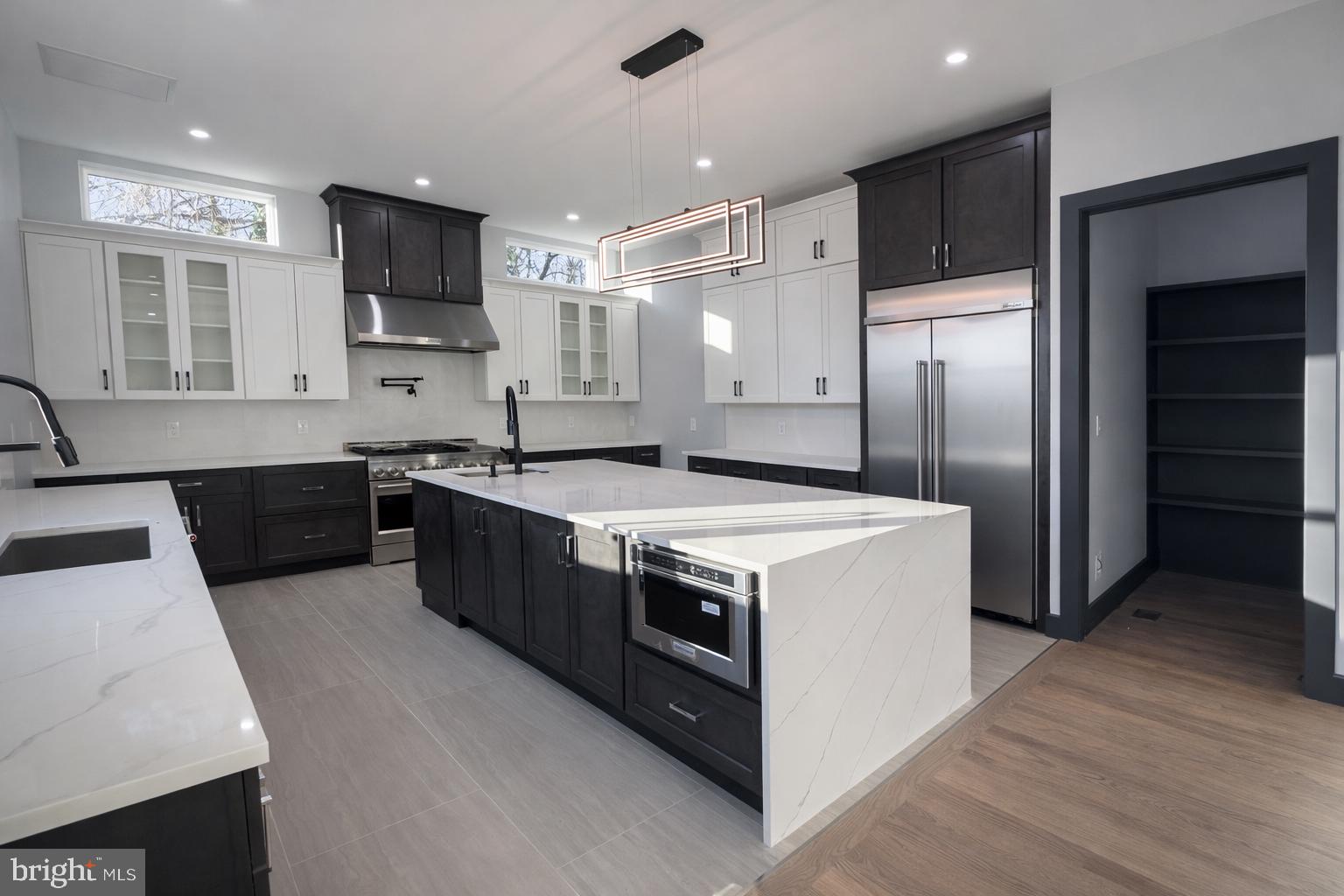 2613 Beacon Hill Road Alexandria, VA 22306 - Photo 17 of 65 Sleek modern kitchen with elegant finishes.