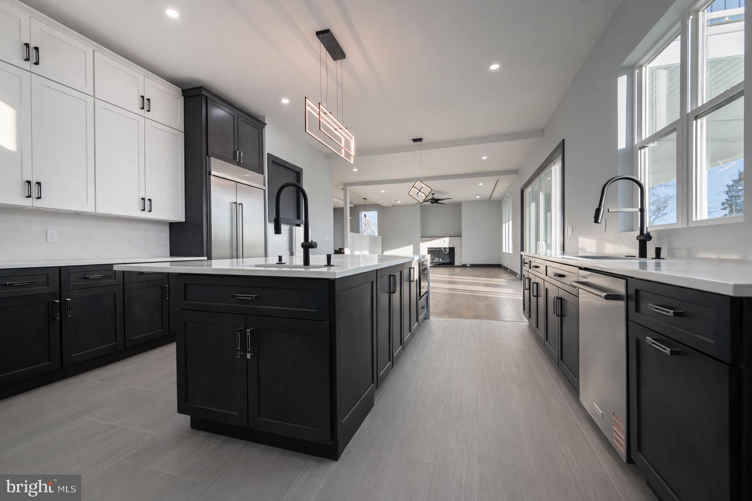 2613 Beacon Hill Road Alexandria, VA 22306 - Photo 19 of 65 Sleek modern kitchen with bright accents.
